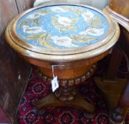 A Victorian walnut work table with circular hinged beadwork top. D-56, H-75cm.