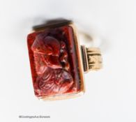 A 19th century yellow metal (stamped 14) and jasper? cameo ring, carve with the bust of a soldier