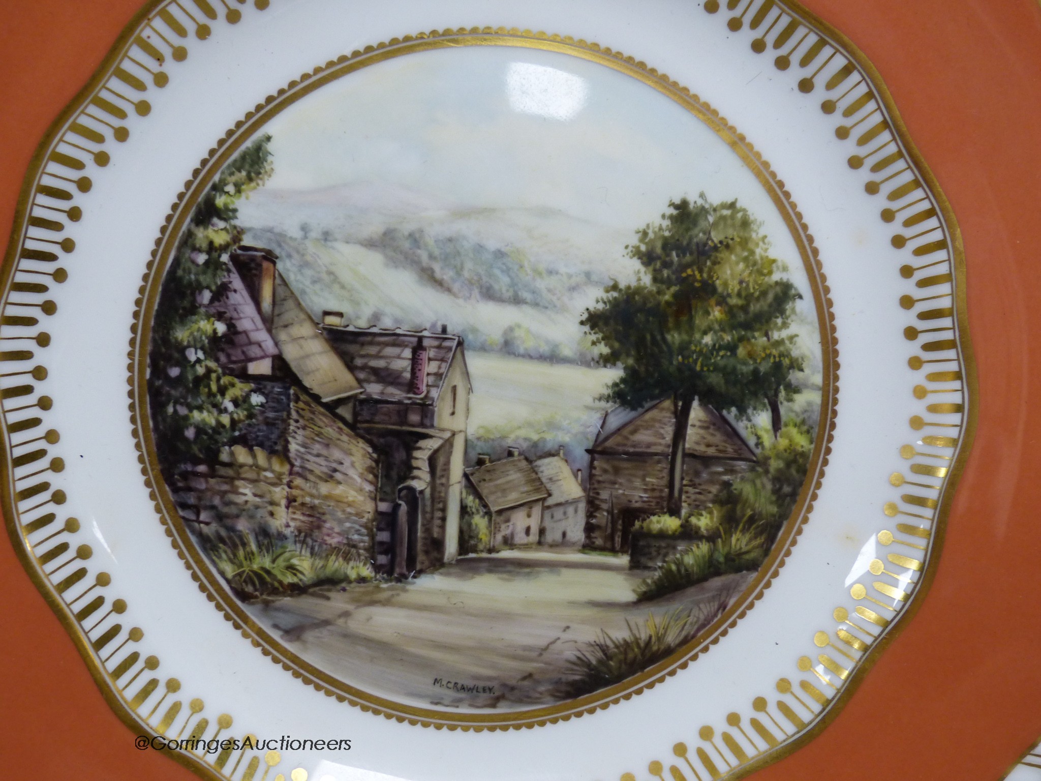 A Royal Crown Derby plate painted with a view of Stoney Middleton, Derbyshire under a burnt orange - Image 2 of 4