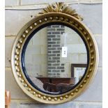 A Victorian gilt circular mirror. D-62cm.