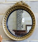 A Victorian gilt circular mirror. D-62cm.