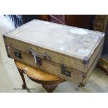A large early 20th century vellum suitcase, W-84, D-50cm.