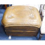 A tan leather footstool. W-58, H-36cm.
