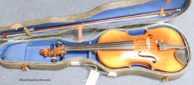 A student violin in case