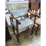 A pair of 18th century French walnut armchairs.