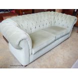 A Victorian style button chesterfield settee, upholstered in green dralon, W-210, D-100, H-72cm.