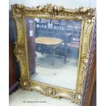 A Victorian rectangular gilt wood and gesso wall mirror. W-102, H-124cm.