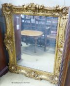 A Victorian rectangular gilt wood and gesso wall mirror. W-102, H-124cm.