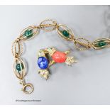 A yellow metal and caged chrysoprase bead bracelet, 18.5cm and a costume brooch.