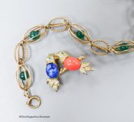 A yellow metal and caged chrysoprase bead bracelet, 18.5cm and a costume brooch.