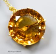 A yellow metal mounted citrine brooch, 20mm, gross 11.8 grams.