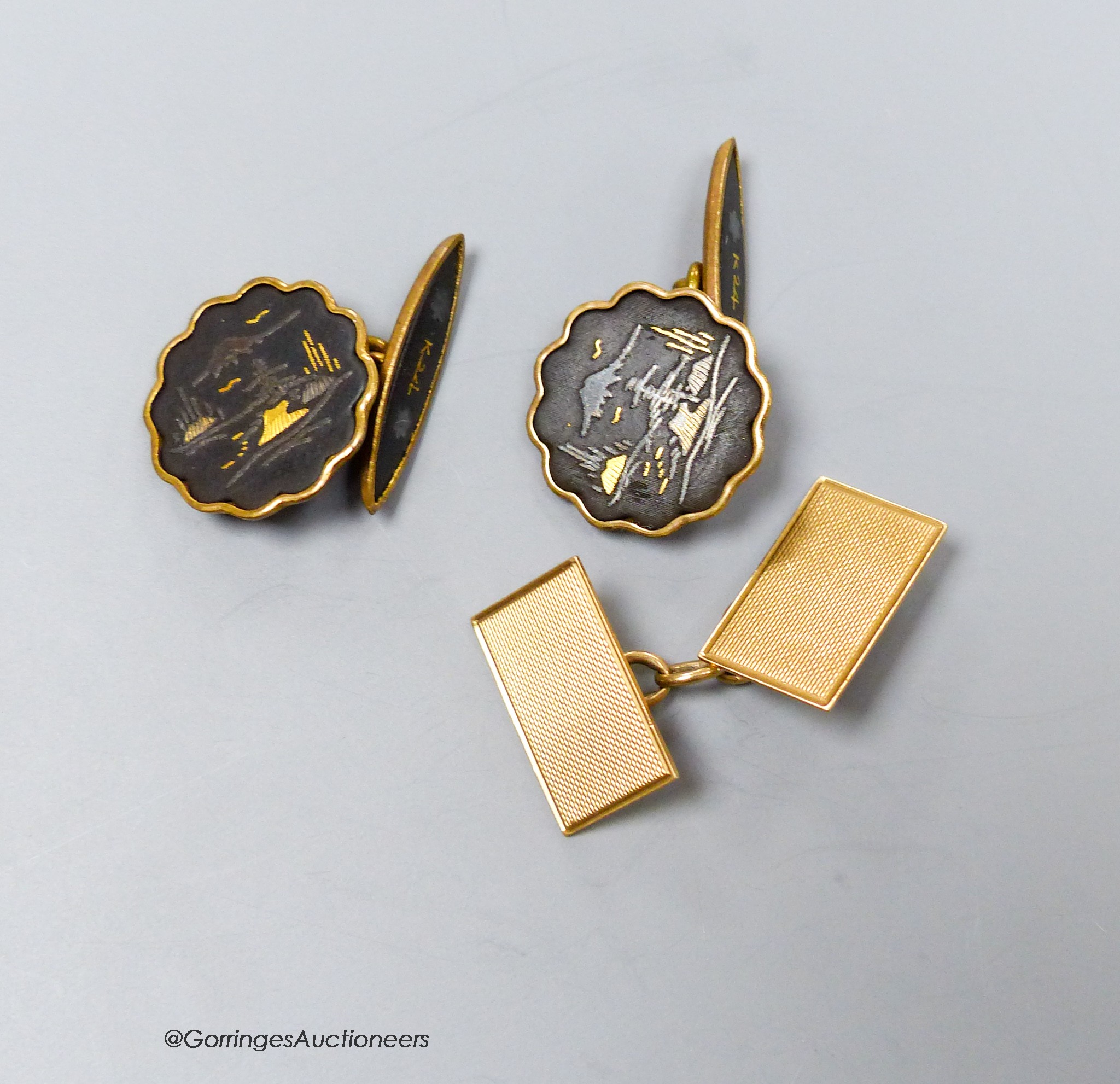 A single 9ct cufflink, 2.2 grams and a pair of Japanese Shakudo cufflinks.