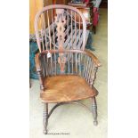 A Victorian ash and elm Windsor armchair.