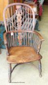 A Victorian ash and elm Windsor armchair.