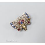 An Edwardian yellow and white metal, ruby, sapphire, diamond and split pearl set butterfly brooch,