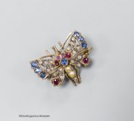 An Edwardian yellow and white metal, ruby, sapphire, diamond and split pearl set butterfly brooch,