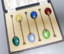 A cased set of six silver gilt and enamel coffee spoons, Birmingham, 1954.