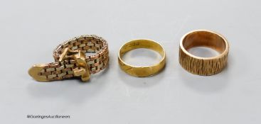 A bark textured 9 ct. rose gold ring, a small 18ct gold band (2.7 grams) and a two colour 9ct gold