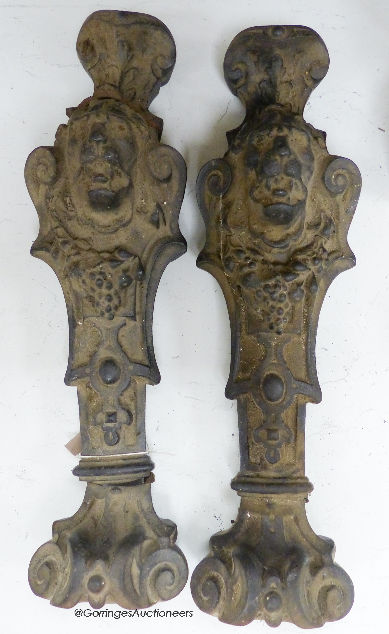 A pair of cast iron ‘lion’ monopodia mounts, 52cm high