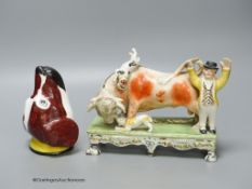 A 19th century Staffordshire bull baiting group, width 19cm, and a 19th century English porcelain