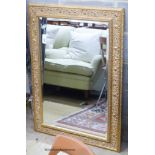 A rectangular Victorian style gilt wall mirror, 80 x 110cm.