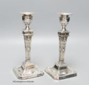 A pair of late Victorian Adams design silver candlesticks, Sheffield, 1898, 20cm, weighted.