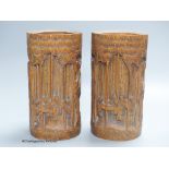 A pair of Chinese bamboo brush pots, carved with figures, signed to bases, height 21.5cm