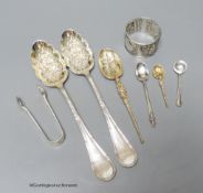 A pair of Edwardian silver berry spoons, minor flatware and an Indian? white metal napkin ring.