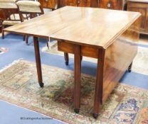 A George III drop leaf dining table. 151cm extended, D-120, H-75cm