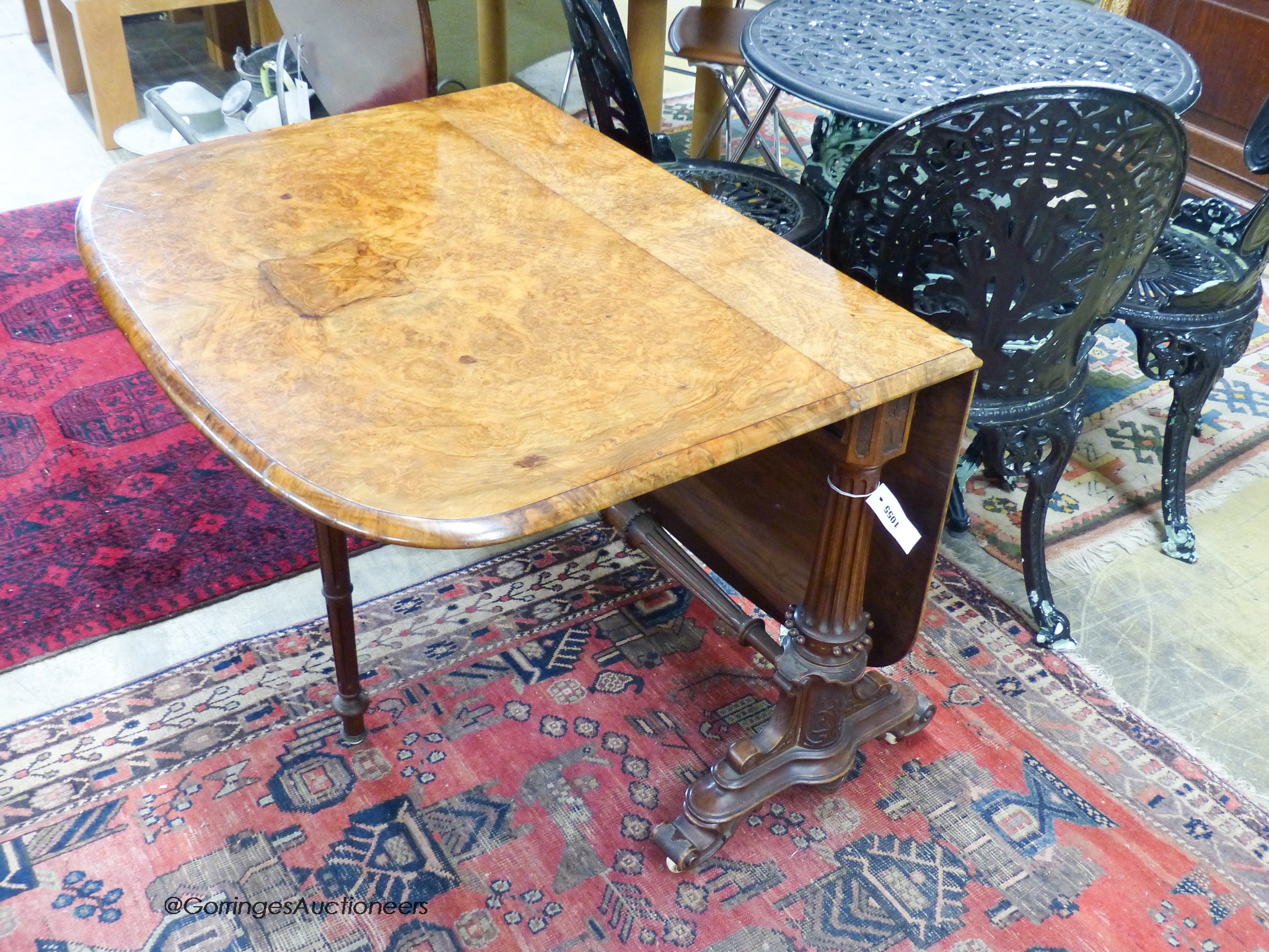 A Victorian burr walnut Sutherland table. 120cm extended, H-66cm. - Image 2 of 2