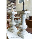 A pair of cast stone faux marble baluster column lamp bases H excluding fittings 49-cm.