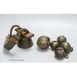 Five 18th century bronze crotal bells, by Robert Wells of Aldbourne, Wiltshire, numbered 3,4 and 8