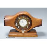 A Smith's aeroplane propeller hub mantel timepiece, 38cm long