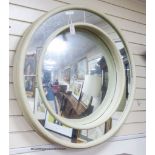 A Julian Chichester marginal plate convex wall mirror. D-102cm.