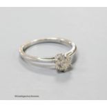 An 18ct white gold and solitaire diamond ring, size K/L, gross 2.2 grams.