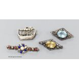 Two gem-set silver openwork lozenge-shaped brooches (possibly Scandinavian), a silver brooch in the