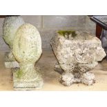 A pair of reconstituted stone acorn finials. H-42cm. Together with a stone garden planter.