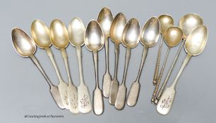 A small collection of Russian 84 zolotnik spoons including a set of six early 20th century by