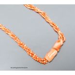 A modern twisted quadruple strand coral bead necklace, 78cm.