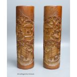 A pair of Chinese bamboo brush pots, carved with scholars in gardens, height 36cm