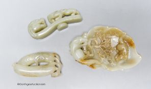 Three Chinese celadon jade carvings, a 'squirrel' brushwasher, 'dragon' belt hook and a carving of