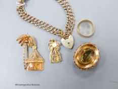 A 9ct gold bracelet, a 9ct filigree pendant and brooch, a 9ct and citrine brooch and a yellow metal