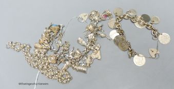 A silver charm bracelet, a silver necklace and a silver silver bracelet mounted with various coins,