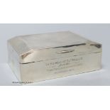 A George VI silver cigarette box, with military related inscription, Birmingham, 1939, 13.7cm,