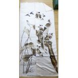 A pair of Chinese embroidered silk panels of birds amid flowers, circa 1900, 130 x 36cm