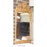 A 18th century gilt wood style wall mirror. W-46, H-100cm.