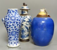 A 19th century Chinese blue and white vase, a similar crackle glaze vase and a powder blue jar,