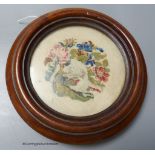A petit point Victorian mahogany framed coaster, 23cm