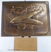 A 1941 calender, bronze finish signed by Alex Henshaw, air racer and test pilot for Vickers