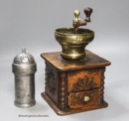 An 18th century oak and brass coffee grinder and a pewter muffineer